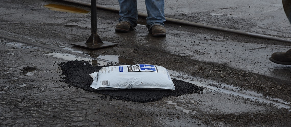 Pothole Repairs Along Railroad Tracks